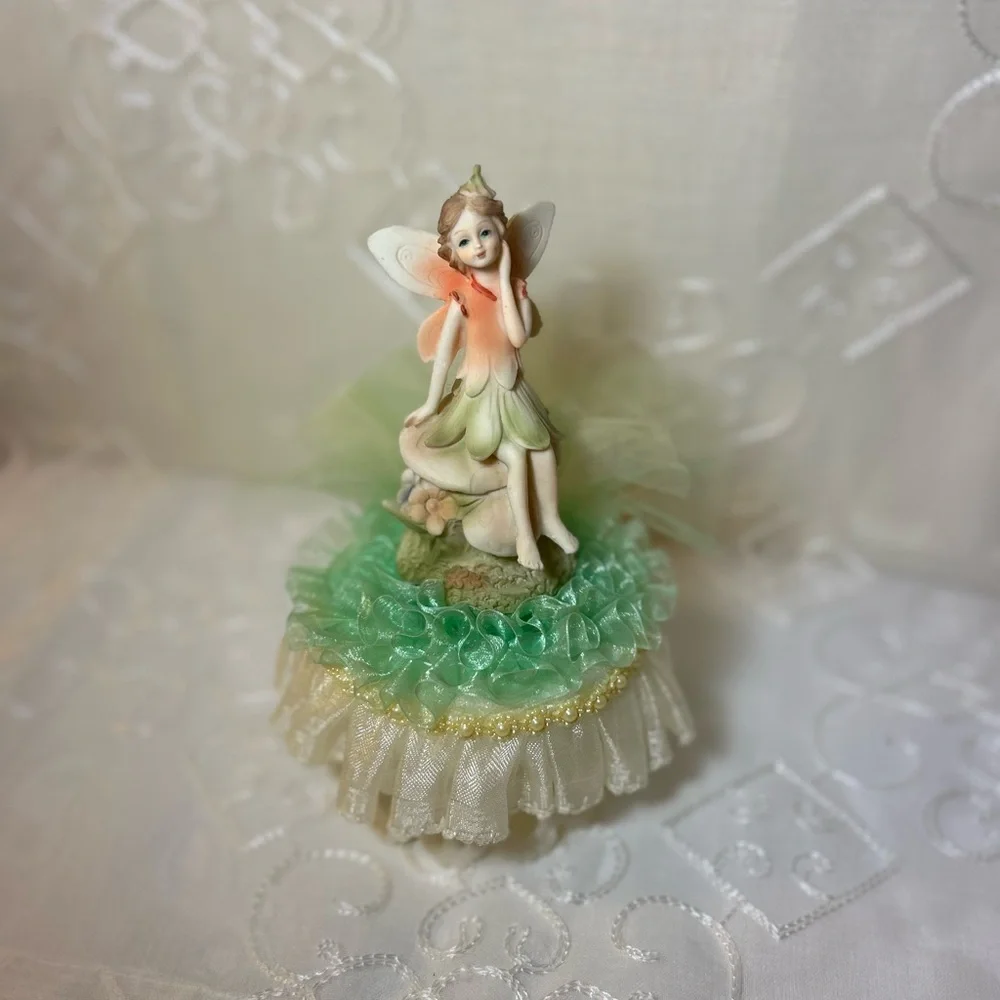Charming Fairy Cake Topper with Gold and Green Details